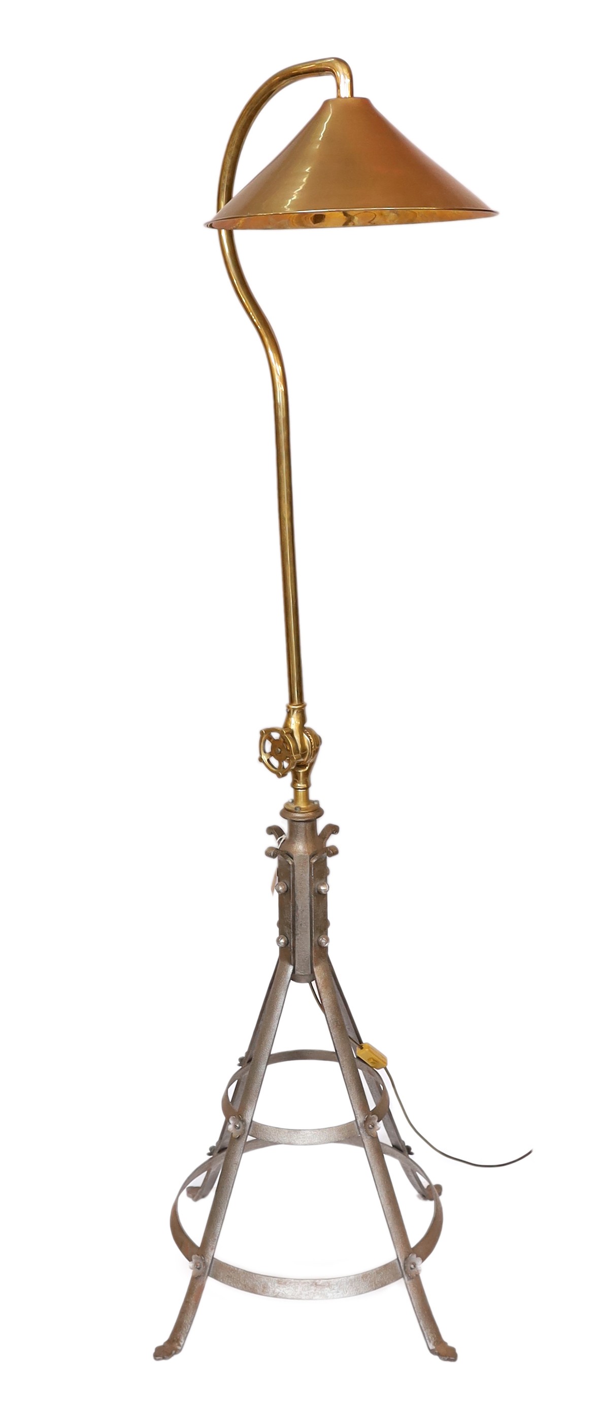 A pair of industrial style brass and wrought iron adjustable lamp standards, height 194cm. width of base 62cm